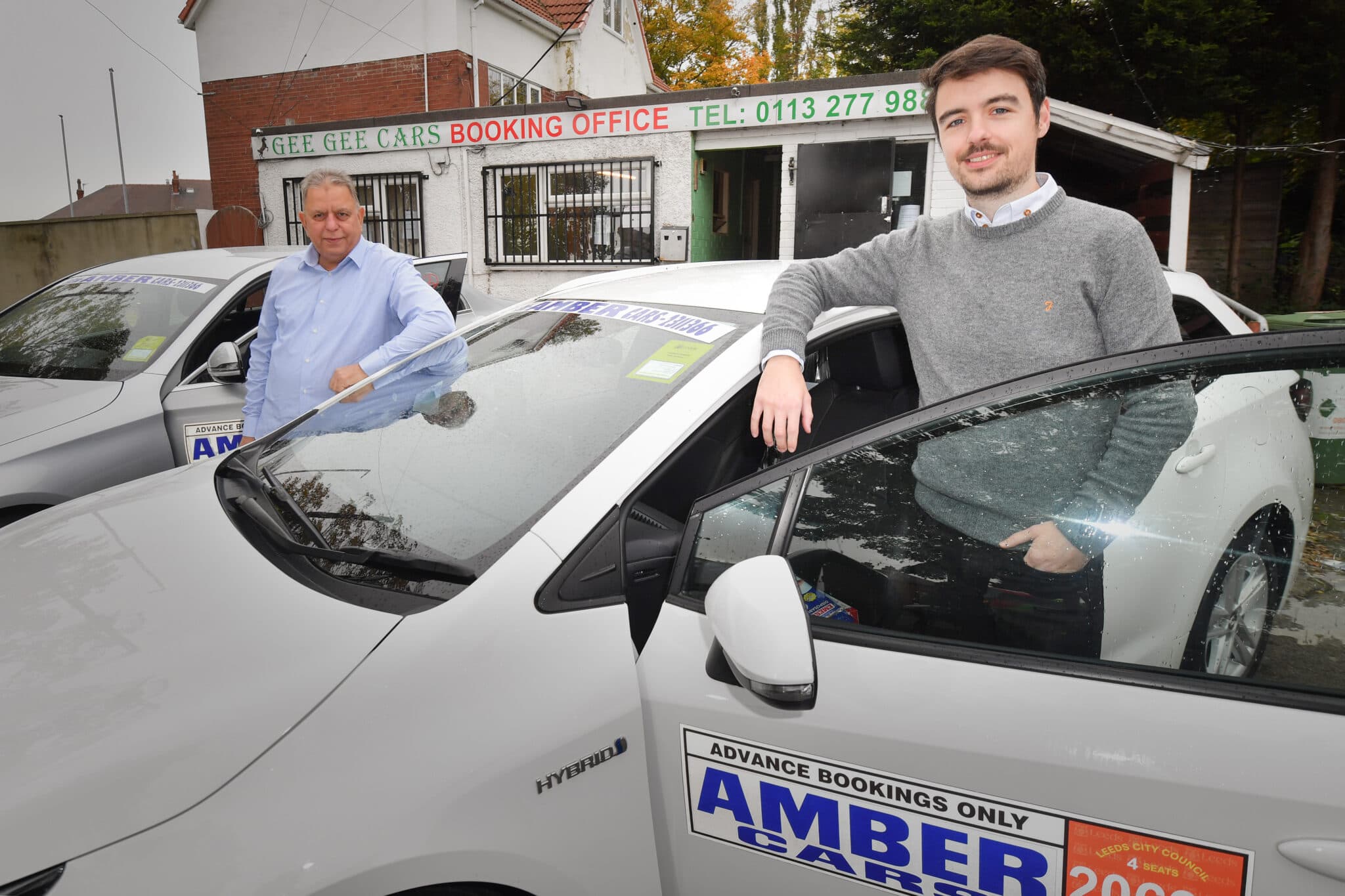 Abdul-Waheed-former-owner-of-Gee-Gee-Cars-with-Chris-Neary-Regional-Director-at-Amber-Cars-which-has-just-acquired-the-company-2048x1365